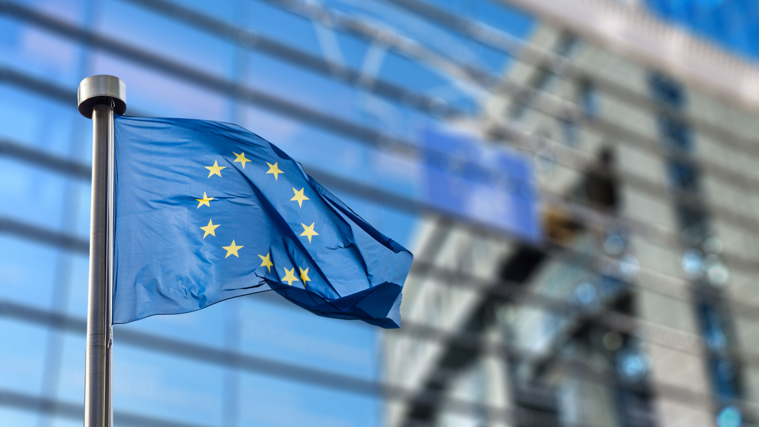 European Union flag against European Parliament SEPA Creditor Identifier